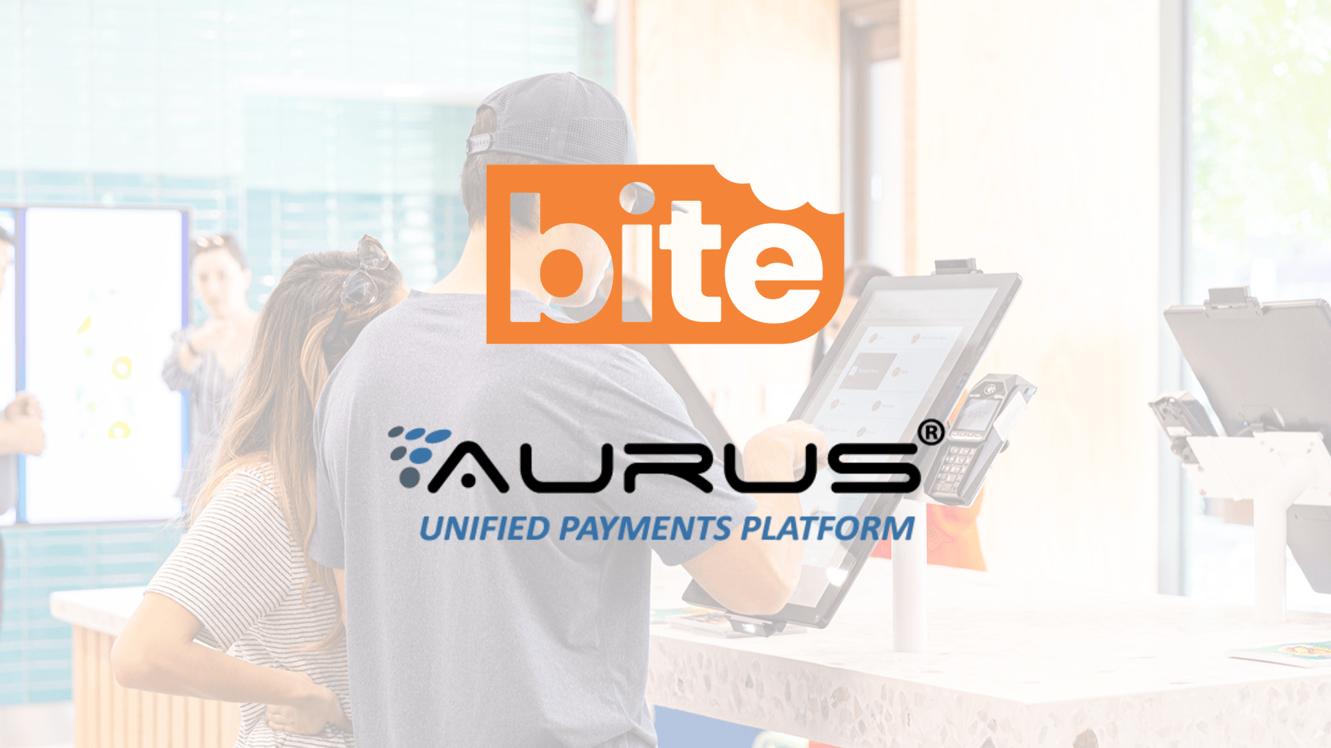 Aurus and Bite logos over an image of a person at a kiosk