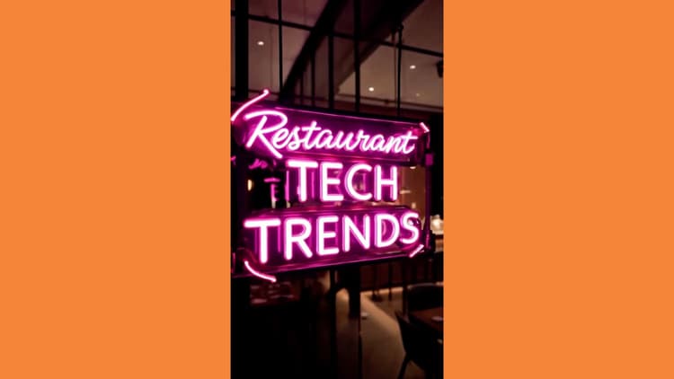 A pink neon sign that says restaurant tech trends