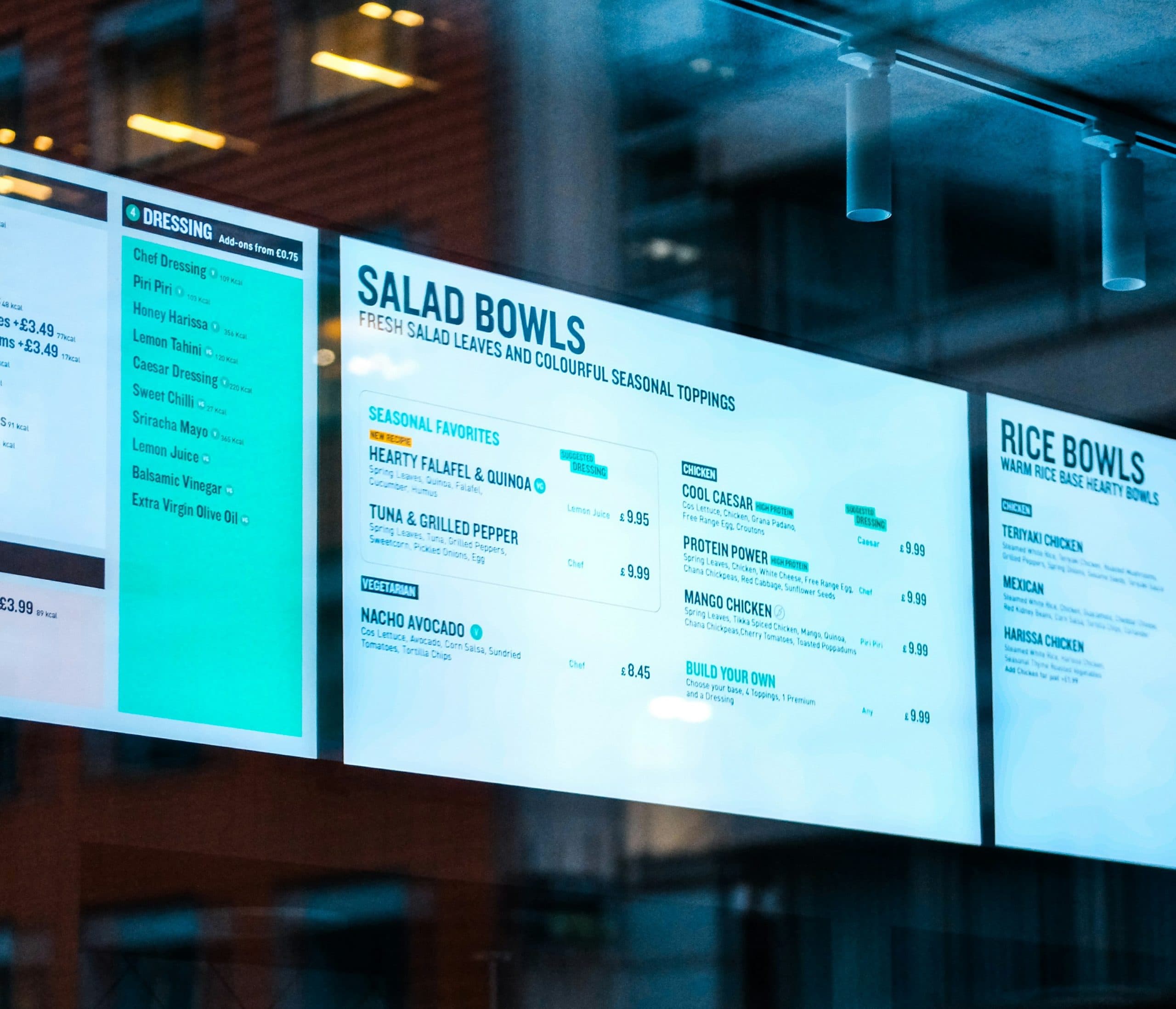 a digital menu board at a fast casual QSR restaurant