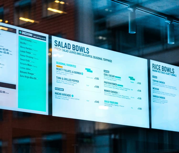 a digital menu board at a fast casual QSR restaurant